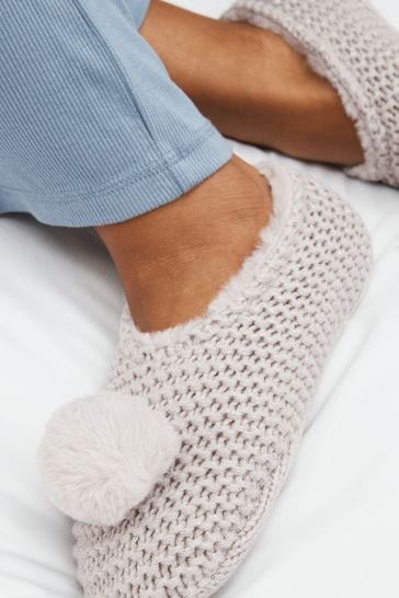 Buy Knitted Footsie Slippers from Next