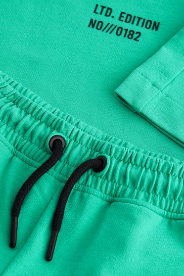 Green shirt and shorts on sale