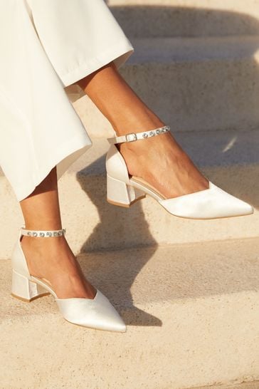Buy Linzi Jordanna Ivory Satin Low Block Court Heels With Embellished Ankle Strap from Next Bahrain
