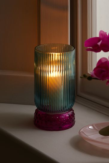 Blue glass hotsell hurricane candle holder