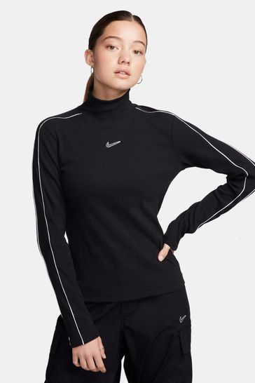 Top negro de manga larga con rayas en las mangas de Nike