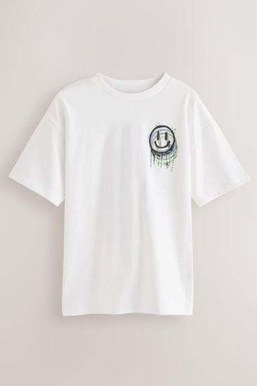 Camiseta gráfica de manga corta con estampado de sonrisa blanca en la espalda y corte relajado (3 - 16 años)