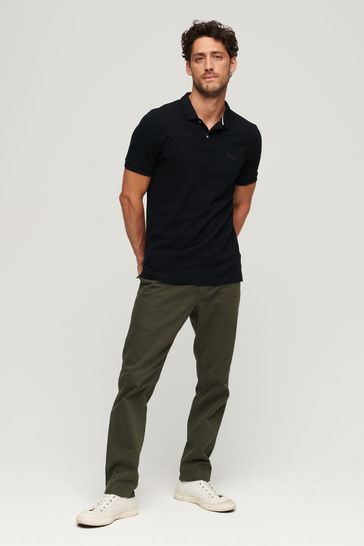 Black polo 2025 shirt and khakis