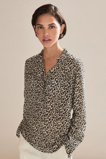 Animal print ruffle blouse 2025