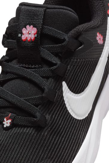 Buy Nike Black White Floral Junior Star Runner 4 Trainers from Next Netherlands