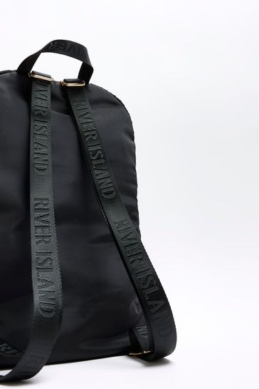 Black nylon hotsell backpack gold zipper