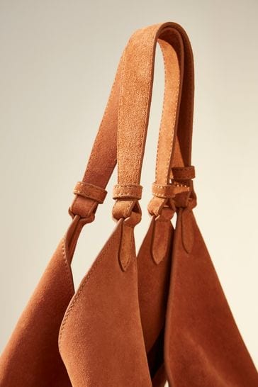 Brown suede bucket deals bag