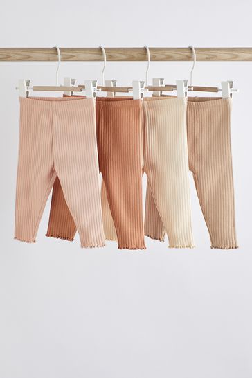 Pack de 4 leggings en tonos marrones y crudo para bebé