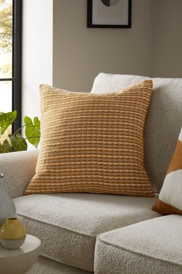 Ochre geometric outlet cushions