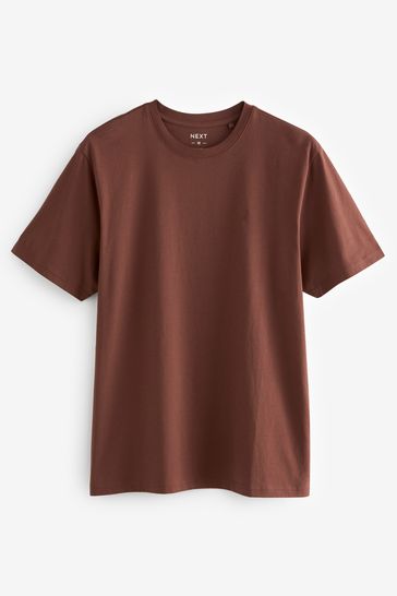 Green t shop shirt and jeans