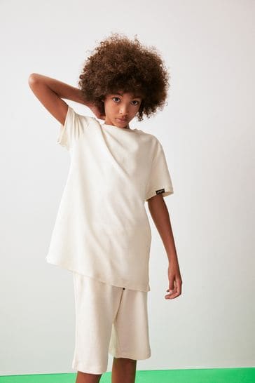 Conjunto de pantalones cortos y camiseta crudo crema con textura (3-16 años)