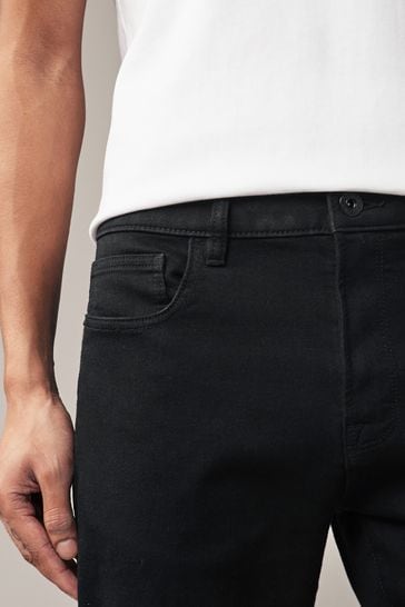 Buy Solid Black Skinny Comfort Stretch Jeans from Next Canada