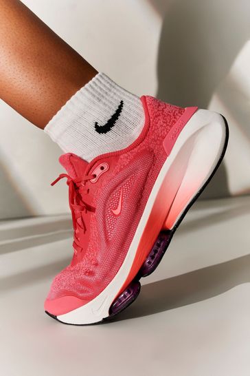 Bright pink nike trainers sale