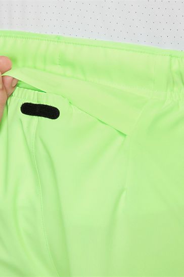 neon green golf shorts