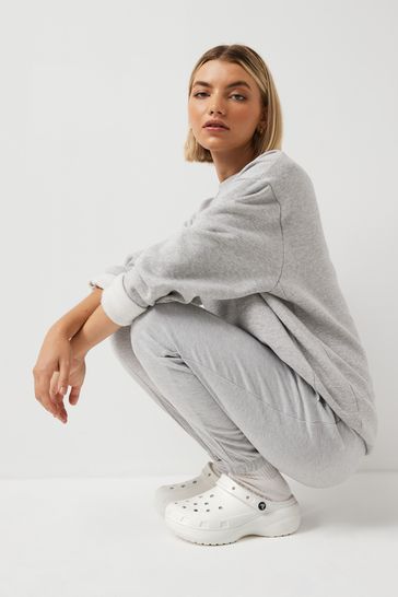 White crocs with fuzzy store inside