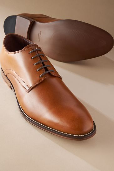 Tan dress new arrivals flats