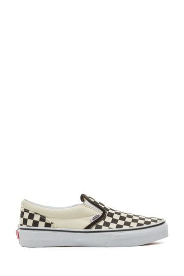 Vans classic slip best sale on black and white