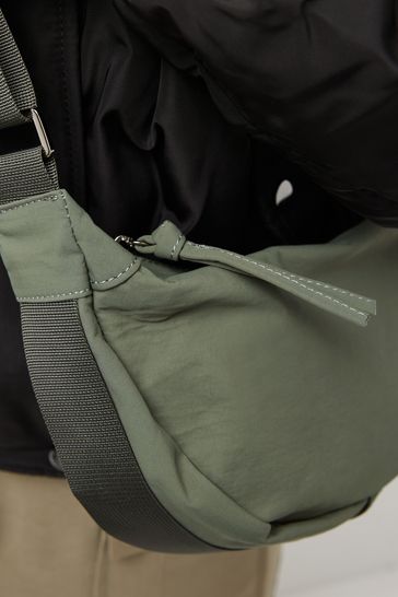 Khaki sling bag deals