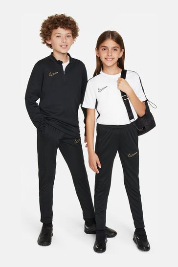 Nike black and gold clothing discount