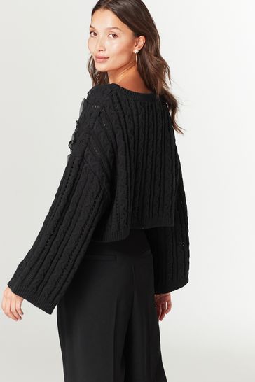 Black ruffle hotsell sleeve jumper
