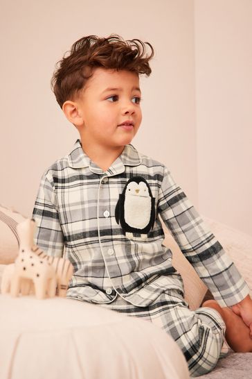 Buy Neutral Black Penguin Button Down Pyjamas 9mths 8yrs from Next Luxembourg