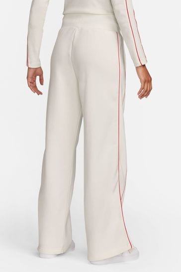 Nike track pants with stripe online