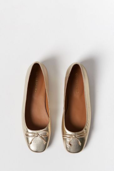 Gold colored new arrivals flats