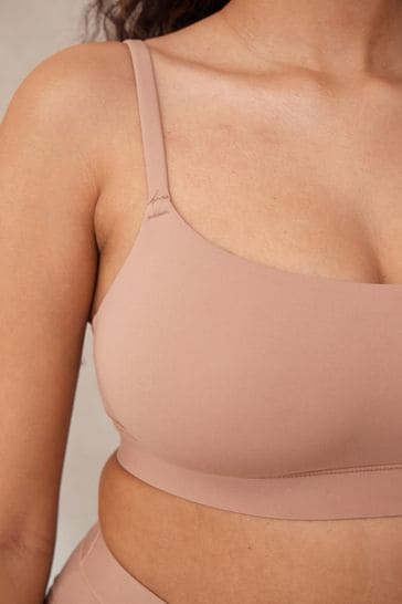 Buy self. Natural Smoothing Comfort Non Wired Bralette from Next USA