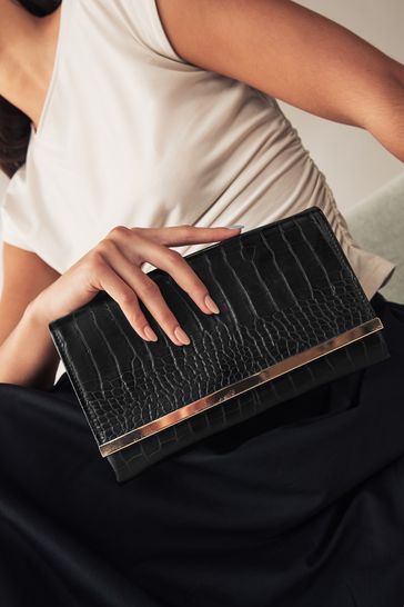 Black clutch with strap hot sale