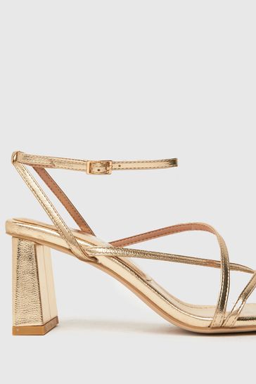 Schuh hotsell gold heels