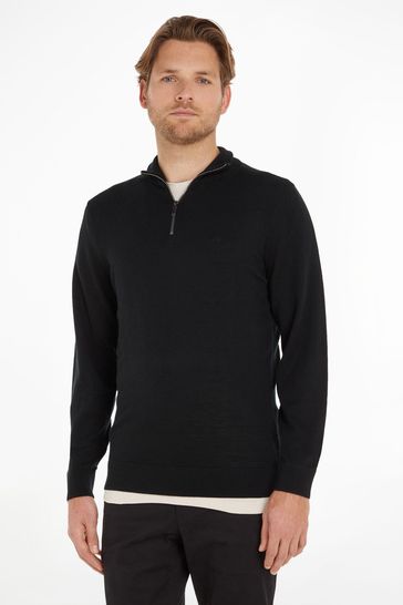 Suéter negro de lana merino con media cremallera de Calvin Klein