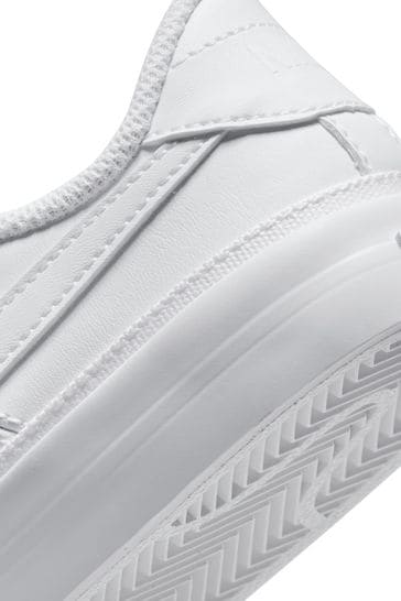 Junior nike shop white trainers