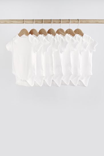 Ofte talt Modregning Kom op Buy White 7 Pack Essential Baby Short Sleeve Bodysuits from Next USA