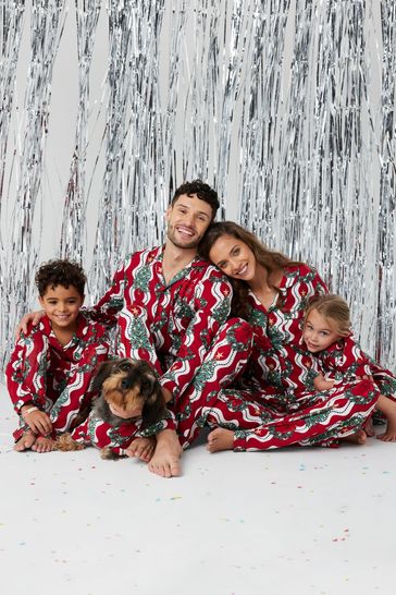 Buy Chelsea Peers Red Curve Recycled Fibre Wreath Tree Stripe Print Long Pyjama Set from Next Ireland