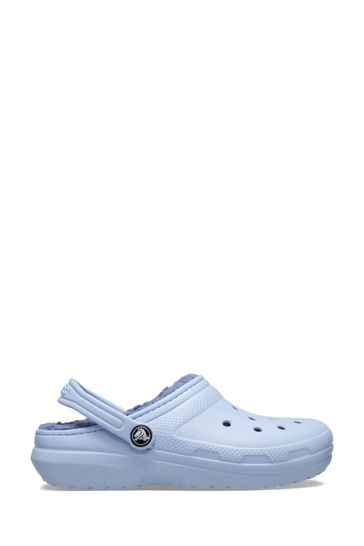 Light blue store crocs with fur