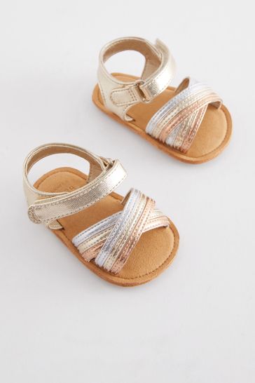 Gold cross clearance strap sandals