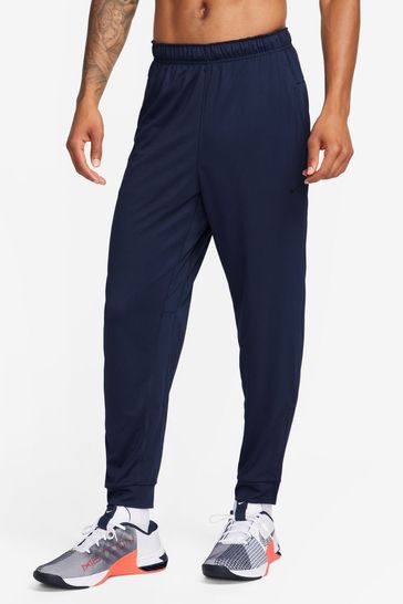 Pantalones de chándal azules de entrenamiento de corte tapered Dri-FIT Totality de Nike