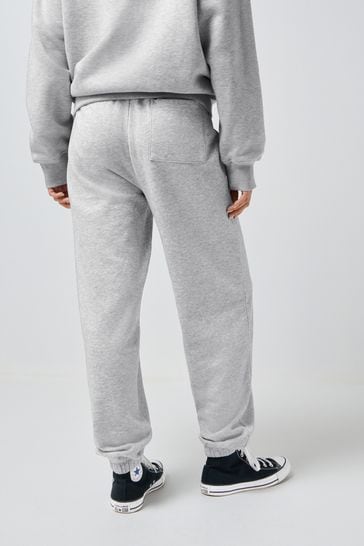Grey graphic joggers sales