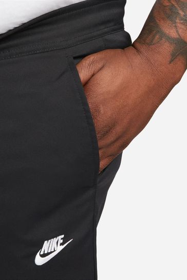 Buy Nike Black Club Woven Tapered Leg Joggers from Next Netherlands