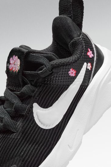 Buy Nike Black White Floral Infant Star Runner 4 Trainers from Next Denmark