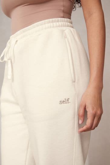 White discount cuffed joggers