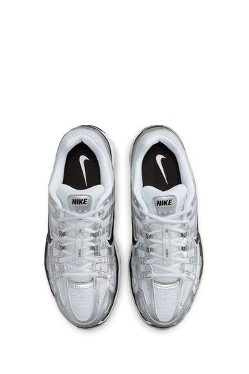 Nike hotsell silver jeans