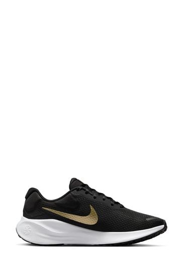 Nike trainers sales with gold tick