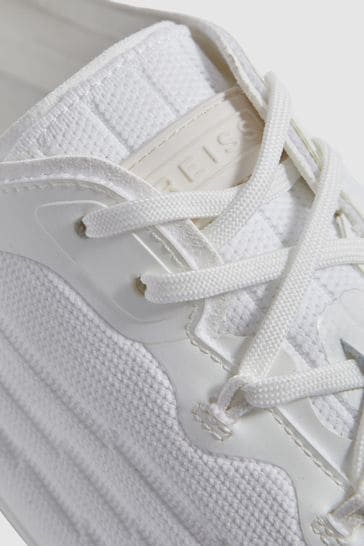 White knitted runner trainers top