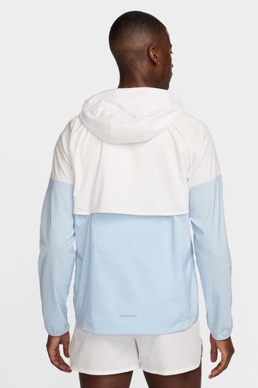 Light blue and white nike windbreaker deals
