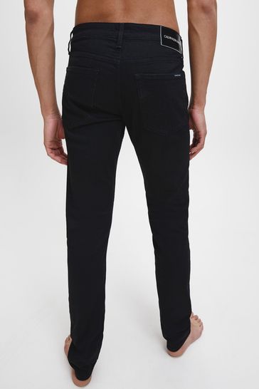 Teleurgesteld embargo Ambient Buy Calvin Klein Jeans Black Ckj 026 Slim Fit Jeans from Next USA