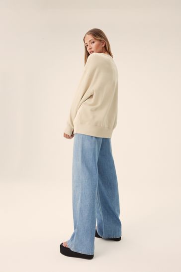 Buy Cream Nike Oversized Varsity Crew Sweatshirt from Next Lithuania