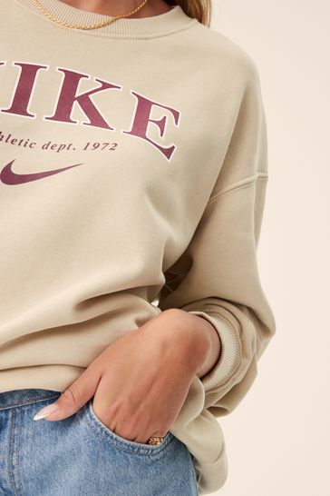 Buy Cream Nike Oversized Varsity Crew Sweatshirt from Next Estonia