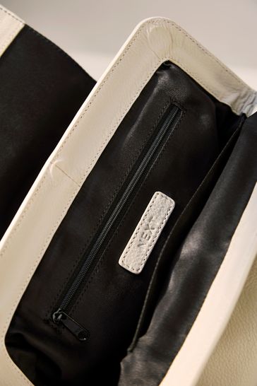 White leather sales clutch bag