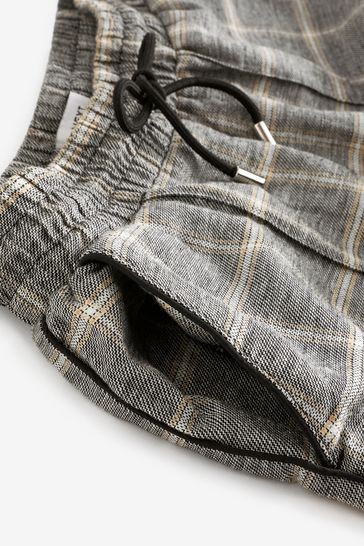 Check outlet stripe trousers